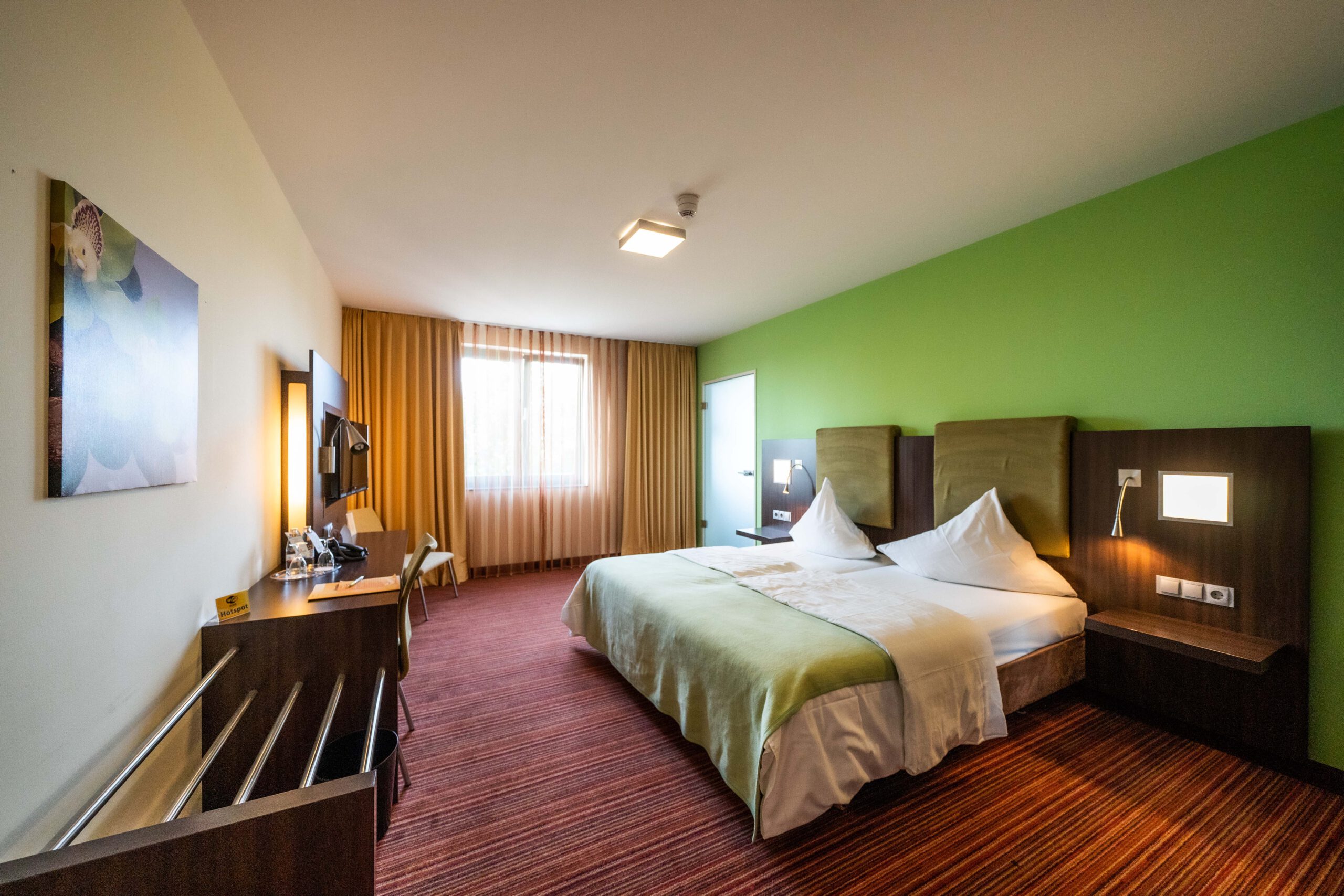 Spacious hotel room with twin beds
